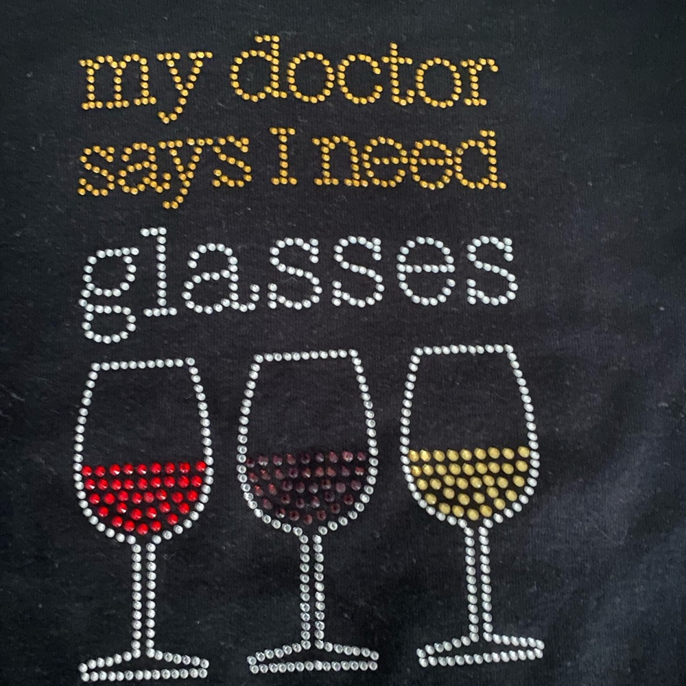 Chris’s Stuff - Ladies black v-neck shirt with crystals. Never worn. Size M